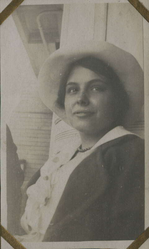 Untitled [Woman wears hat]