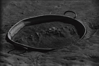 Pan of Sand and Rocks