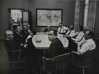 New York Times—Men around Conference Table