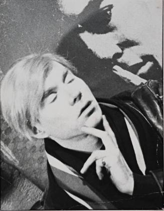 Andy Posing in Front of His Self-Portrait