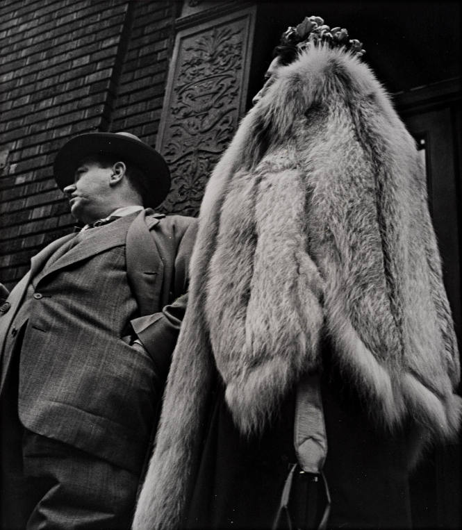 Man in Suit, Woman in Fur Coat