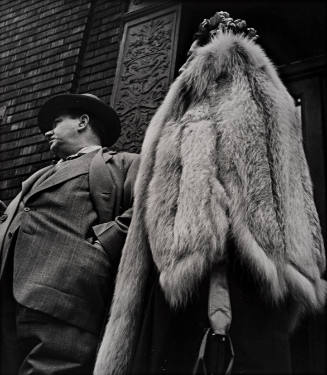 Man in Suit, Woman in Fur Coat