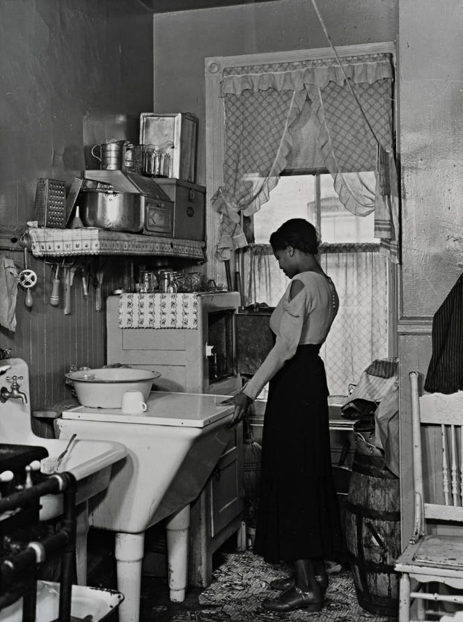 Untitled [Lady in kitchen], from the series Harlem Document