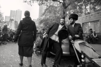 Two Men at Makeshift Carnival / Taylor Street., Brooklyn, NY