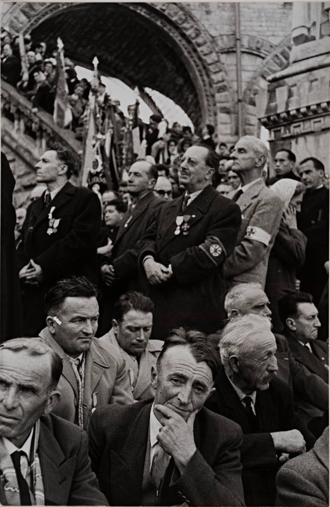 Crowd gathered in cathedral courtyard, Lourde