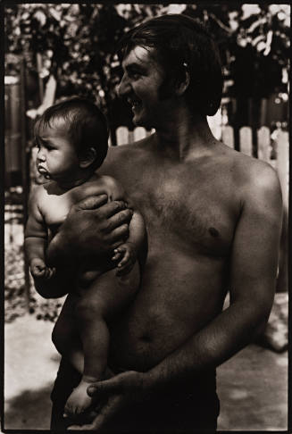 USSR, Vacation Camp (shirtless man holding baby)