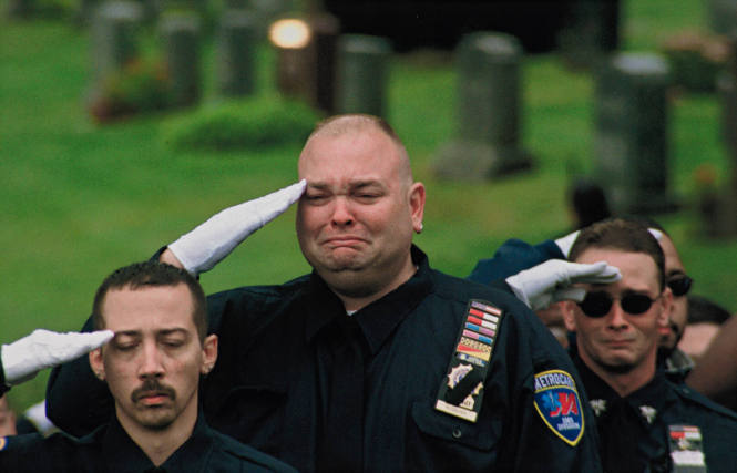 [EMS workers at funeral]