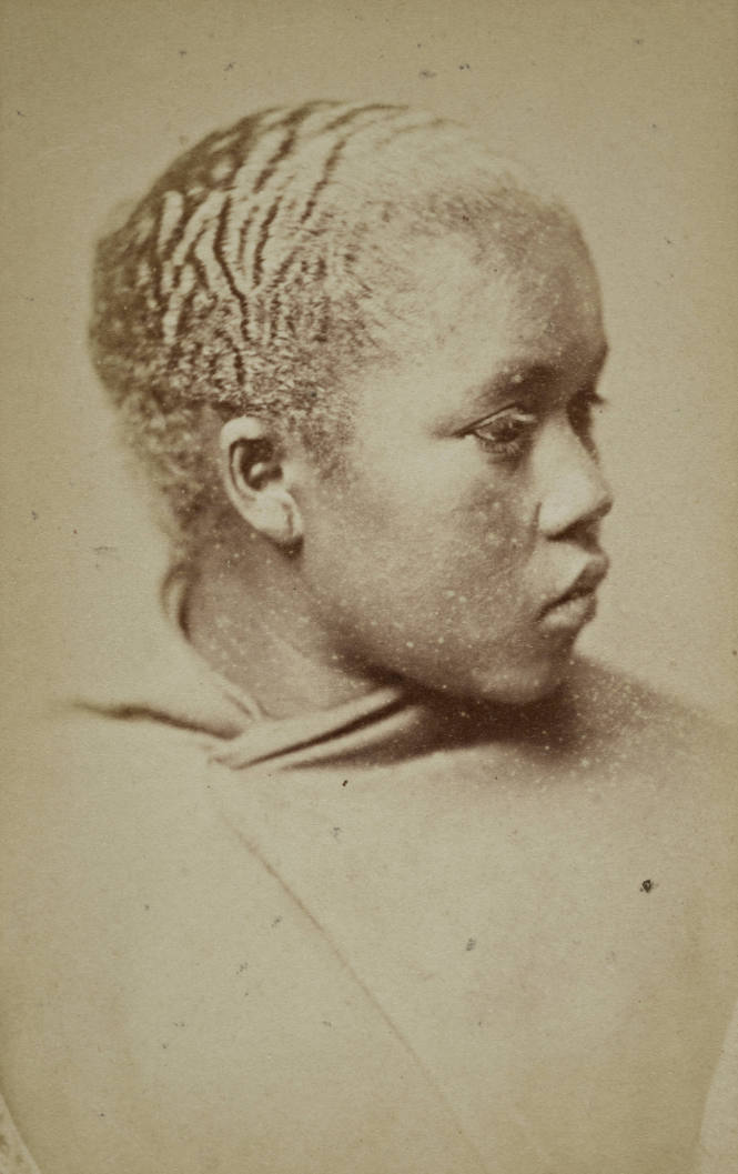 Head-and-Shoulders Portrait of an African Woman Wearing a Cloak