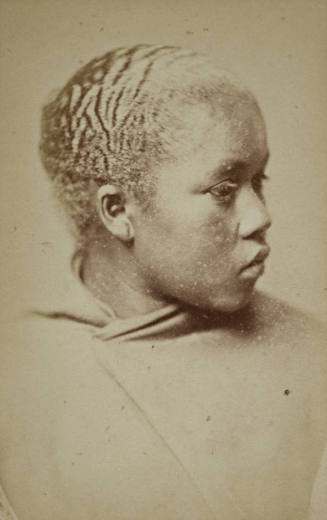 Head-and-Shoulders Portrait of an African Woman Wearing a Cloak