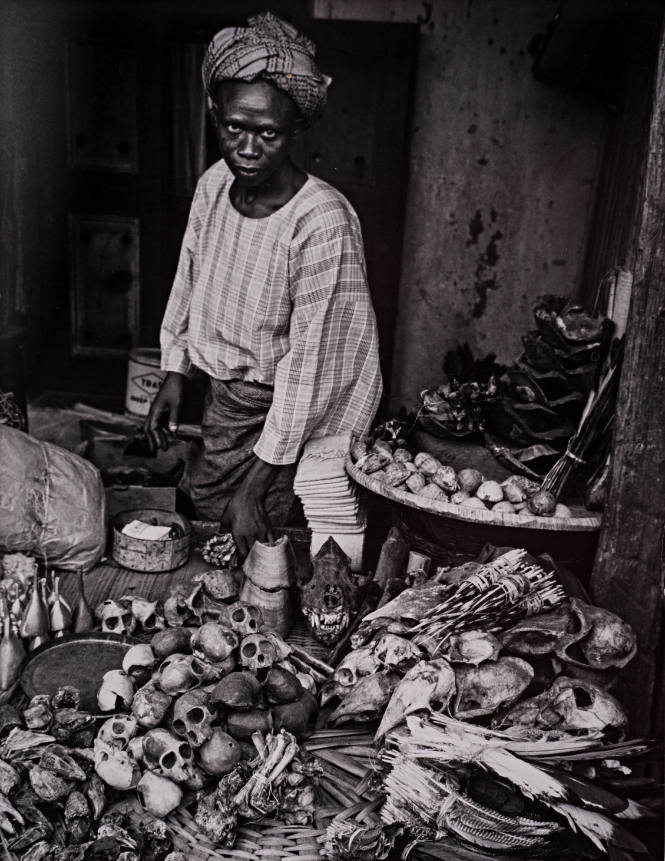 Nigeria, “Witch doctor selling monkey skulls,”