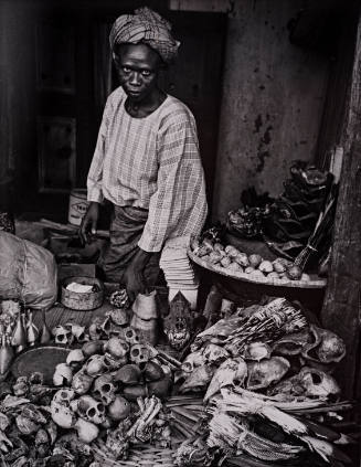 Nigeria, “Witch doctor selling monkey skulls,”