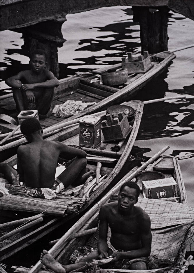 Nigeria (Three boys in canoes)