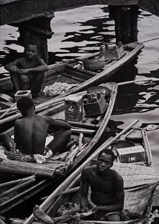 Nigeria (Three boys in canoes)