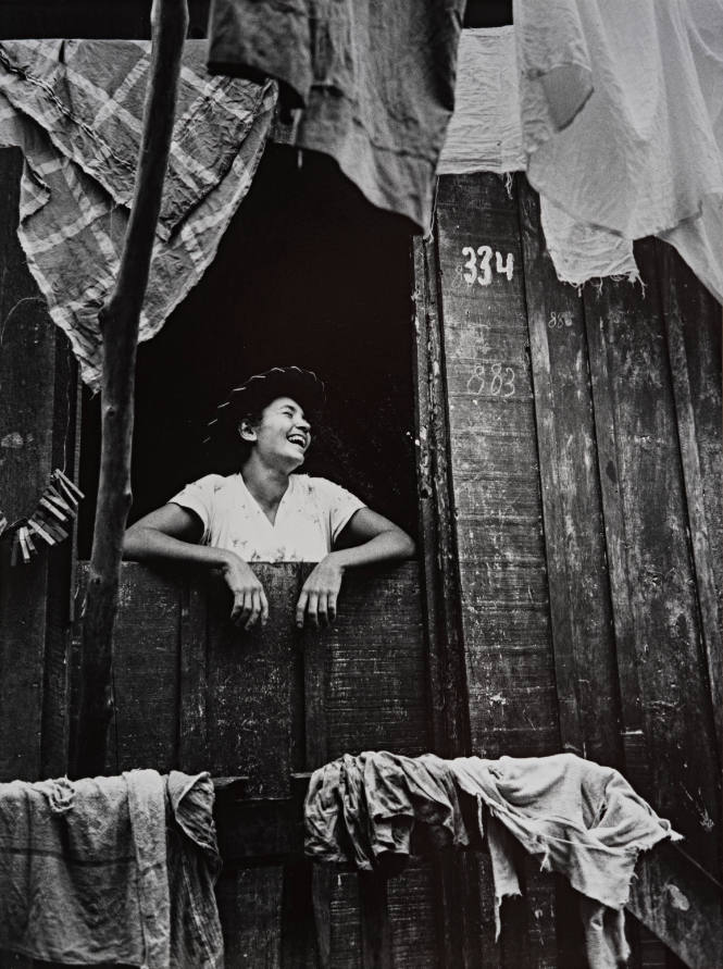 1959, Brazil (Girl laughing in window)