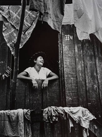 1959, Brazil (Girl laughing in window)