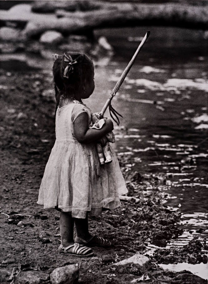 1960, Mexico (Little girl with doll and stick)
