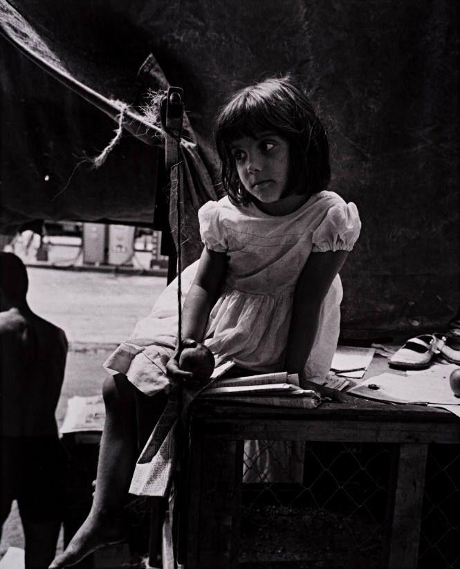 Brazil (Girl seated on table),