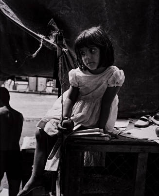 Brazil (Girl seated on table),