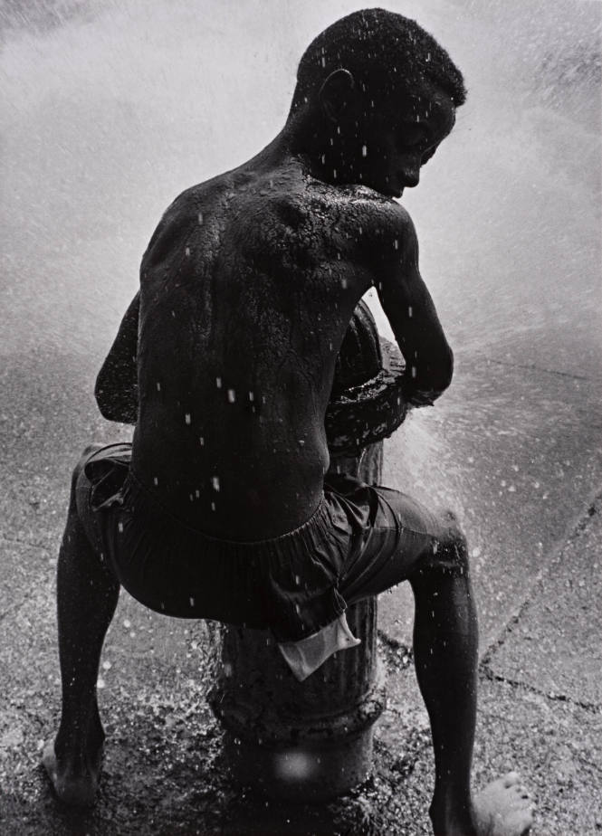 Newark Essay (Boy sitting on fire hydrant)