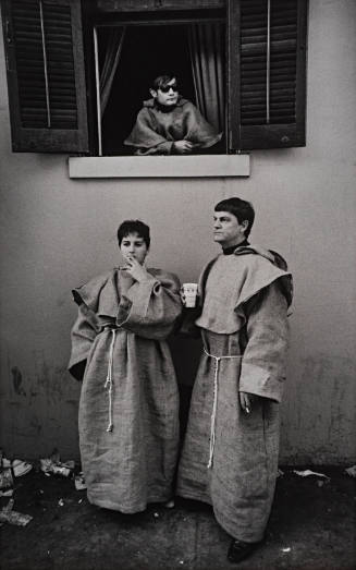 Three people dressed up as monks, Mardi Gras, New Orleans