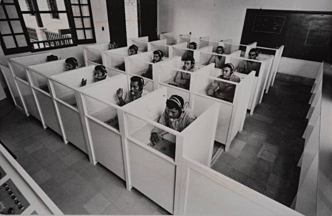 Workers in cubicles, Honduras