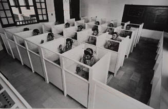 Workers in cubicles, Honduras