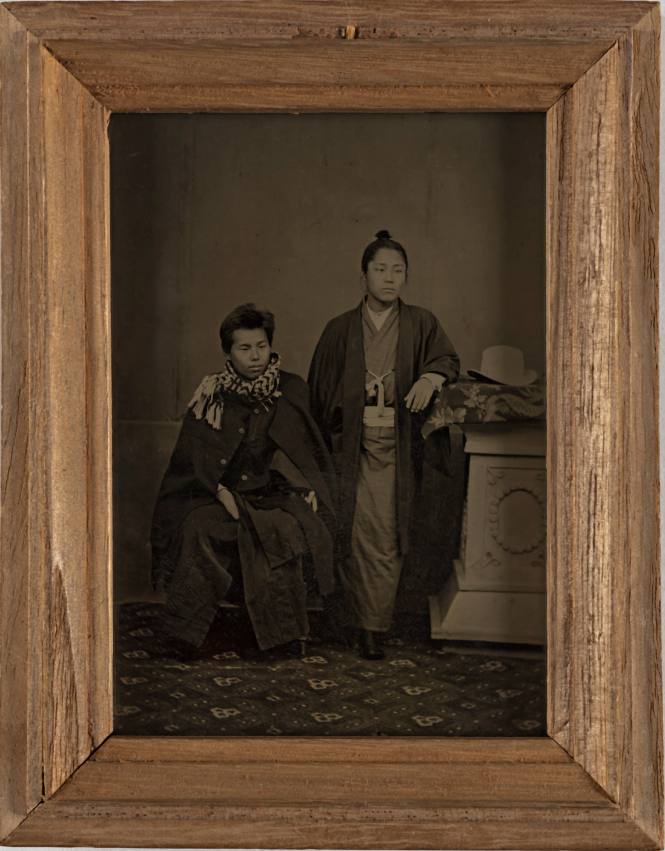 Portrait of Standing Man with Topknot and Seated Man in Western Dress