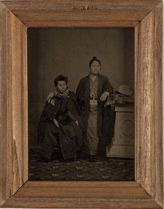 Portrait of Standing Man with Topknot and Seated Man in Western Dress