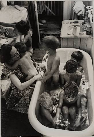 Mother Bathing Seven Children