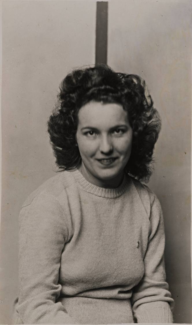 Seated Young Woman, Striped Background