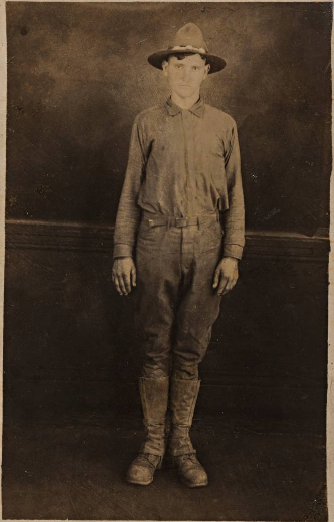 Standing Man in Broad-brimmed Hat