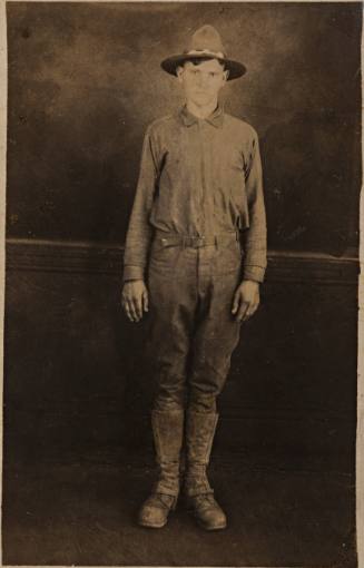 Standing Man in Broad-brimmed Hat