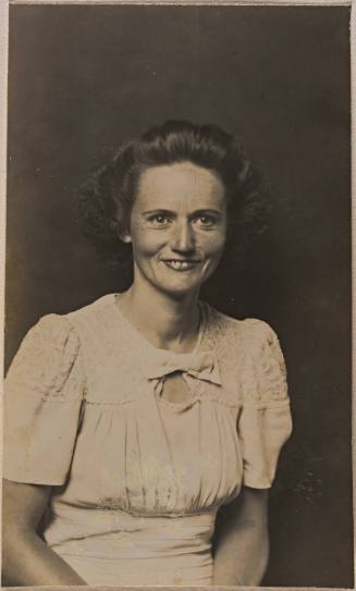 Smiling Woman in Short-sleeve Dress