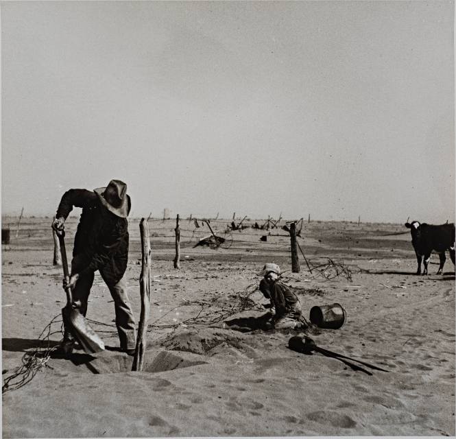 Man and Children Building Fence
