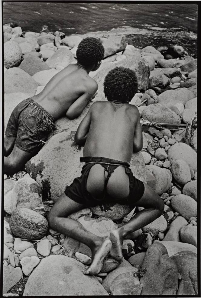 Two Boys on Rocks Near River, Papua New Guinea