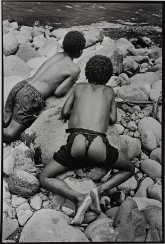 Two Boys on Rocks Near River, Papua New Guinea