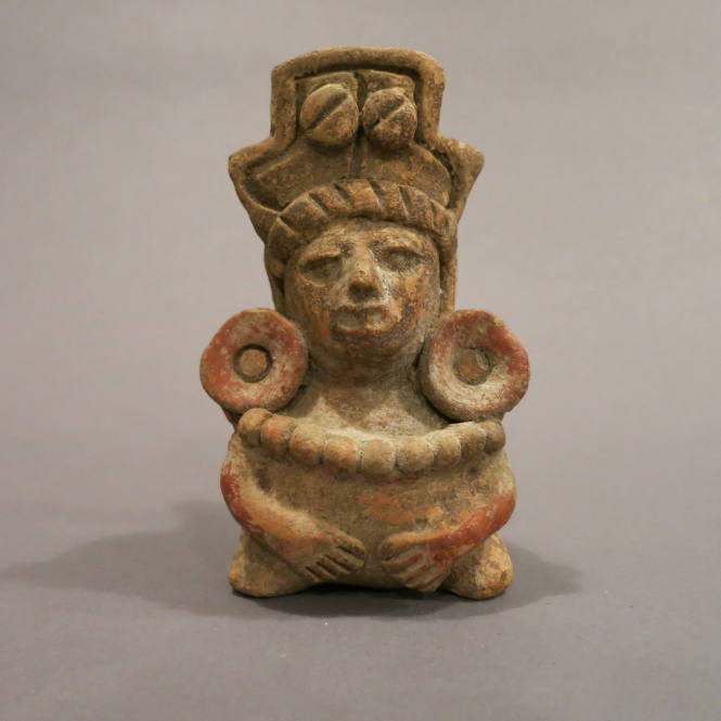 Figure with headdress, ear spools, and necklace