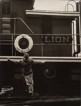 NYC Boy Standing in Front of the Lion, a Ship from Rondout, N.Y.