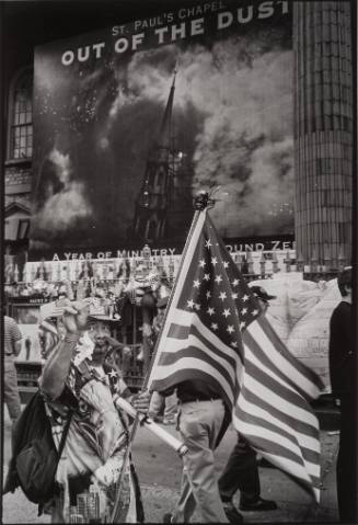 Man with Flag Walking Past St. Paul's Chapel, New York City, USA