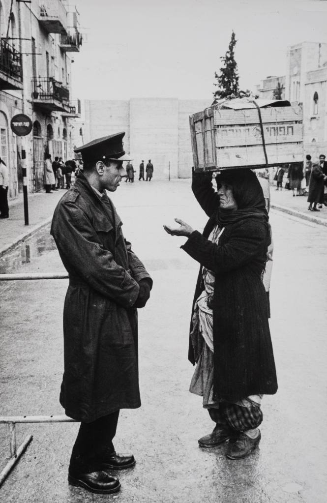 What Was Once the Mandelbaum Gate, a Jewish Israeli Man Talks with Christian Arab Israeli Woman, Jersusalem, Israel