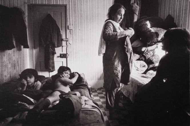 A Family of Eight Puts Mattresses on the Floor at Night and Stacks Them Up by Day, London, England