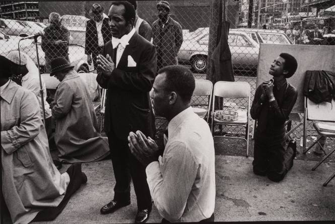 Men Praying on the Street, New York City, USA