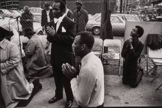 Men Praying on the Street, New York City, USA