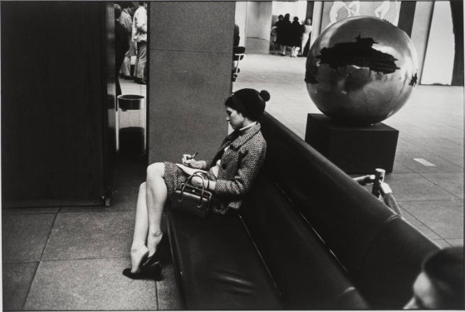 Untitled, from Women are Beautiful [Woman Writing on Bench Near Pomodoro Sculpture]