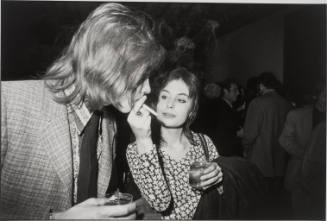 Untitled, from Women are Beautiful [Young Woman Giving Young Man a Drag on a Cigarette]