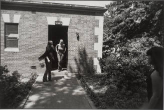 Untitled, from Women are Beautiful [Two Women Leaving Women's Room]