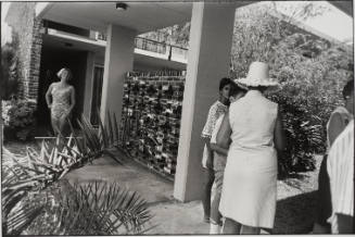 Untitled, from Women are Beautiful [Woman in Bathing Suit Leaving Motel]