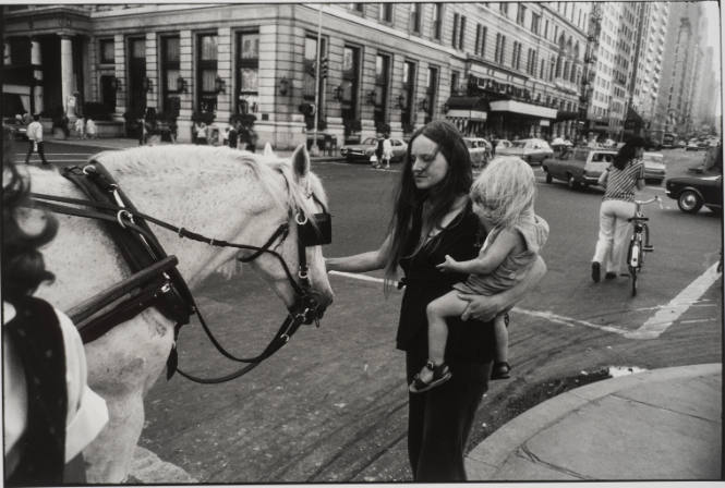 Untitled, from Women are Beautiful [Young Mother and Child Petting a Horse Near the Plaza Hotel]