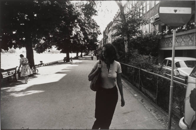 Untitled, from Women are Beautiful [Woman Walking Along Quay]
