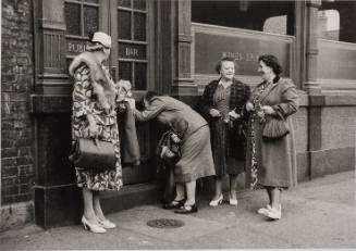 Bermondsey Women's Pub Outing, London (Four women at a bar door)
